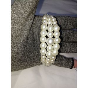 Faux pearl bracelet with silver accents. NWOT